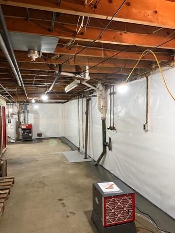 CleanSpace Wall System - A durable wall system that creates a clean, bright appearance while directing wall moisture into the basement's waterproofing system.