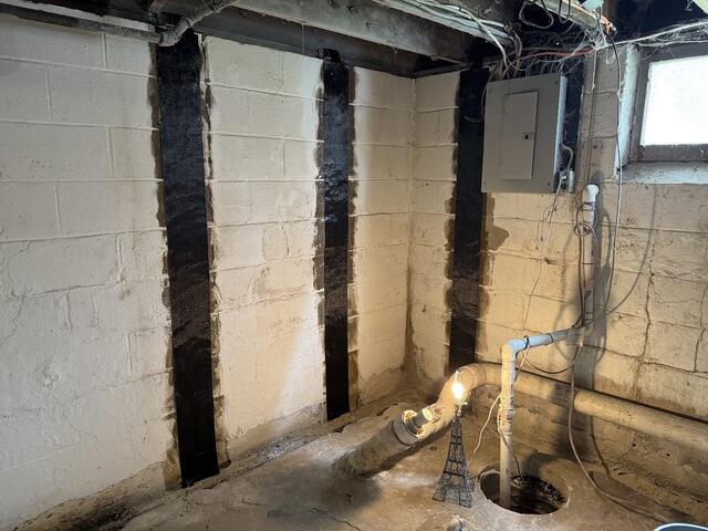 Five CarbonArmor straps were installed along the problem area of this foundation wall to provide additional reinforcement. The low-profile carbon fiber system is designed to help strengthen the wall and resist further inward movement while taking up minimal basement space.