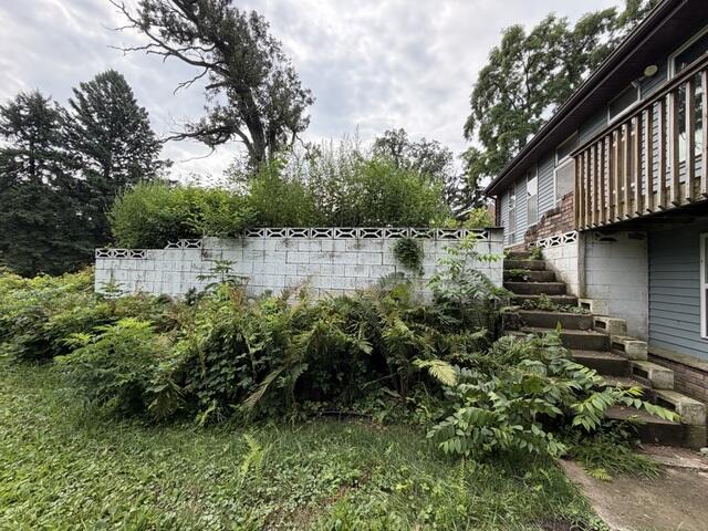 Before: Our Design Specialist, Brady, recommended securing and stabilizing the damaged foundation.