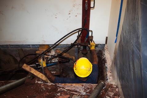 Push Piers are designed to provide deeper structural support beneath a foundation. The steel piers are advanced through the soil until suitable supporting material is reached, creating a new load path beneath the affected portion of the structure.