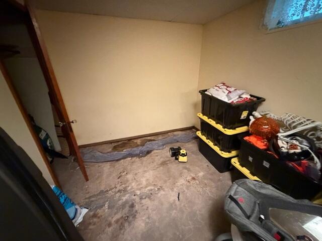 Before: Our Design Specialist, Ryan, recommended waterproofing the entire basement.