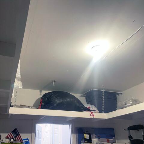 The garage ceiling was uninsulated, allowing cold temperatures from the garage to affect the kitchen floor above. Cold air leaking through the garage door contributed to cold floors and freezing pipes. To address these issues, we drilled holes into the garage ceiling cavities and dense-packed them with TruSoft cellulose insulation. This creates a thermal barrier that helps reduce heat loss, improve kitchen comfort, and prevent the pipes from freezing during the winter.