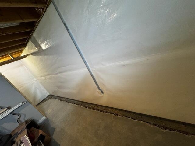 The crew sealed the leaky walls and installed WaterGuard to drain the water out of the basement.