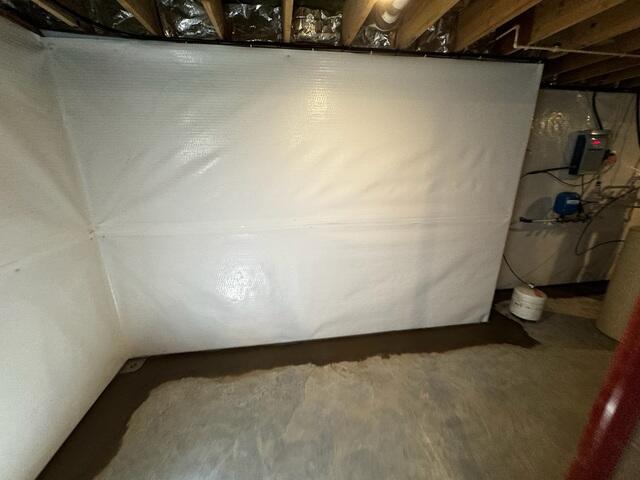 Lastly, the crew re-concretes the floors around the basement perimeter, leaving a gap between the floor and the wall to allow water to drain into the system.