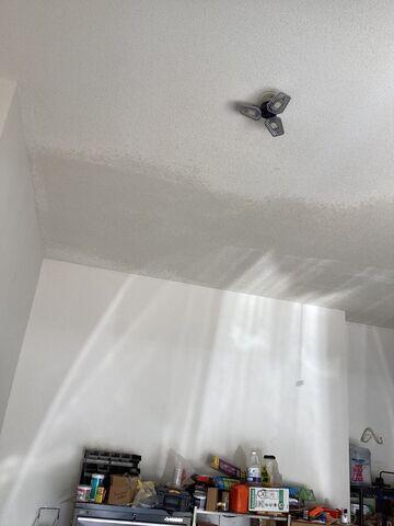 After: Popcorn texture applied over the repaired ceiling sections to match the surrounding existing texture.