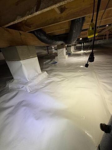 After sealing up the crawl space floors, walls, and supports, the area is immediately less damp, musty, and humid.