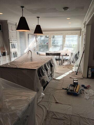 New drywall installed and the repaired area being taped and finished.