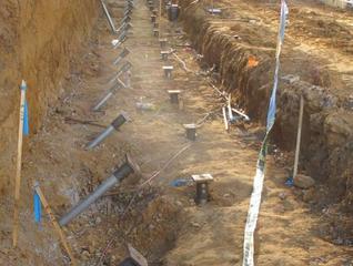 Vertical and battered helical piles installed