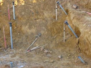 Vertical and battered helical piles installed