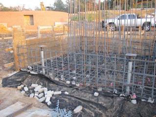 Model 350 compression piles - four tension piles along opposite edge