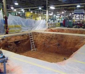 Completed press pit one (background) and press pit two post-excavation (foreground)