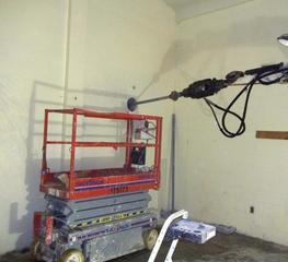 Helical anchors installed from inside basement prior to demolition