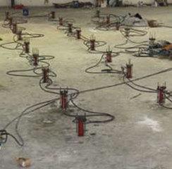 Lift cylinders fitted to installed slab piers