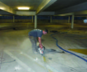 Concrete slab cut to eliminate binding during lift