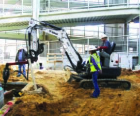 Installing helical piles within stadium