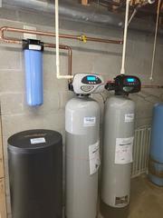 Equipment that was installed by the Clean Water Center. Took away all the old equipment for them, cleaning up their utility area.