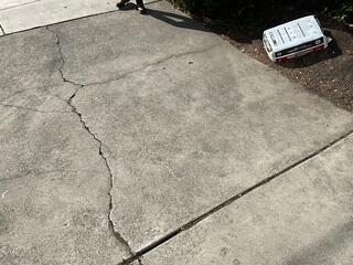 Before image showing settlement and cracking.