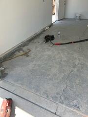 Progress image of the PolyLevel foam having just been installed.