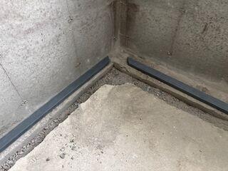 Installing the WaterGuard system on the footing of the basement