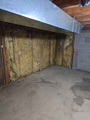 The crawl space prior to being insulated.