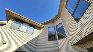 The exterior of the home showing where the bath fans were vented.