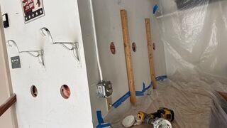 Holes in the garage walls have been drilled.