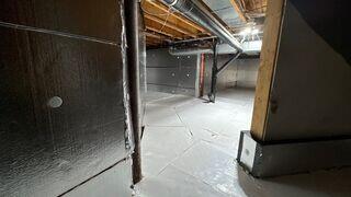 The crawl space with TerraBlock™ insulation.