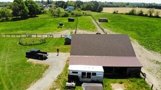 High-angle image of the newly installed barn roof, completed by EZ Exteriors using premium IKO Dynasty shingles in Middletown, Delaware.