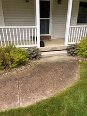 The step has begun sinking causing a gap to form