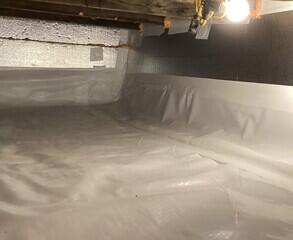 The crawl space was insulated and encapsulated with TerraBlock (floor insulation), SilverGlo (wall insulation), and CleanSpace (vapor barrier).