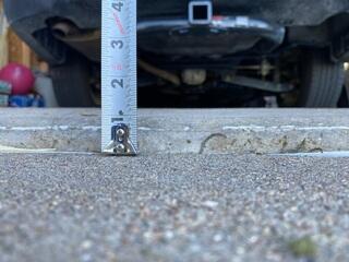 Before: Canon, one of our Design Specialists, recommended lifting the sidewalk back into place.