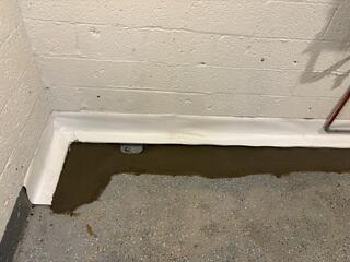 We installed our WaterGuard Drainage System to effectively capture and redirect water away from the foundation, preventing seepage and keeping the basement permanently dry.