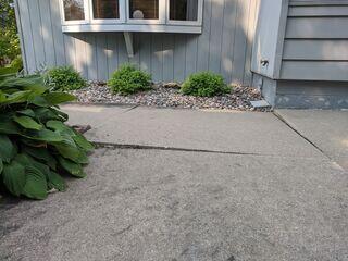 Before: The homeowner was worried their heaving concrete would turn into a tripping hazard
