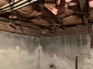 Signs of water and moisture on foundation walls