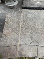 After: The patio's appearance is significantly improved with clean, uniformly sealed joints, indicating a complete and effective restoration.