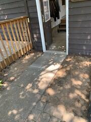 During Dylon, one of our Foreman, and his crew lifted the struggling areas back into place.