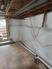 The basement walls were also covered in a layer of CleanSpace to help any moisture permeating the stone foundation walls.