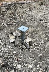 Helical pier with new construction cap installed