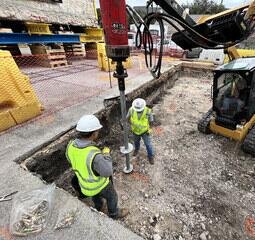 Installing helical piers