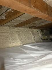 This is the finished encapsulation, the foam insulation is sprayed along the foundation walls ensuring an airtight seal. The white vapor barrier on the floor is our CleanSpace system. It is our 20 mil thick liner manufactured in 7 layers. It is puncture resistant and the white finish really brightens the space.
