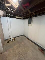 During: The crew attached CleanSpace to the walls and installed WaterGuard and TripleSafe