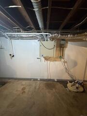 During: Our Foreman, Francisco, and his crew successfully installed all the waterproofing products throughout the basement.