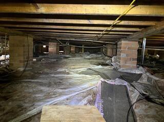 This before photo features the crawl space that Andrew had first crawled into. Pretty messy!