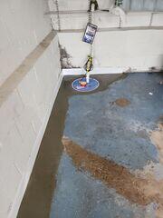 We installed our SuperSump Premier to effectively discharge water collected by the drainage systems. With its powerful pump and airtight lid, it keeps the garage dry and protected, even during heavy rain.