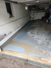 In order to stop surface water from entering through the garage door, we added our TrenchDrain at the entry point. This system captures runoff immediately and channels it into the drainage line, preventing puddles and protecting stored items.