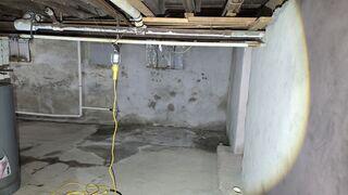 This unfinished basement in Perth Amboy suffered from lingering moisture and a moldy odor.