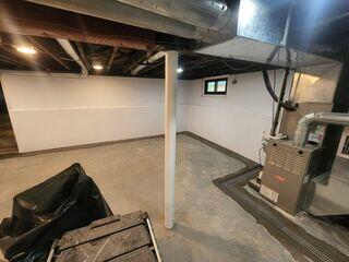 WaterGuard is sealed beneath the new concrete layer, and CleanSpace protects the walls from moisture.