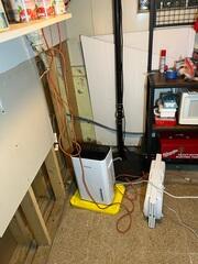 The homeowner's sump pump before it was replaced with our SuperSump+