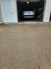 The homeowner's driveway before it was lifted and repaired by our crew