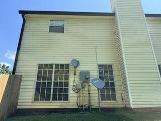 Gutter repaired with sleek updated black gutters.